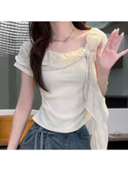 Pure-Style Design with a Waist-Constricting Fit That Slimlines The Figure. Ruffle-Trimmed, Tie-Cuffed Design. Sweet, Plaid Patterned Short-Sleeved Top for Summer, with a Shoulder-Bare Design